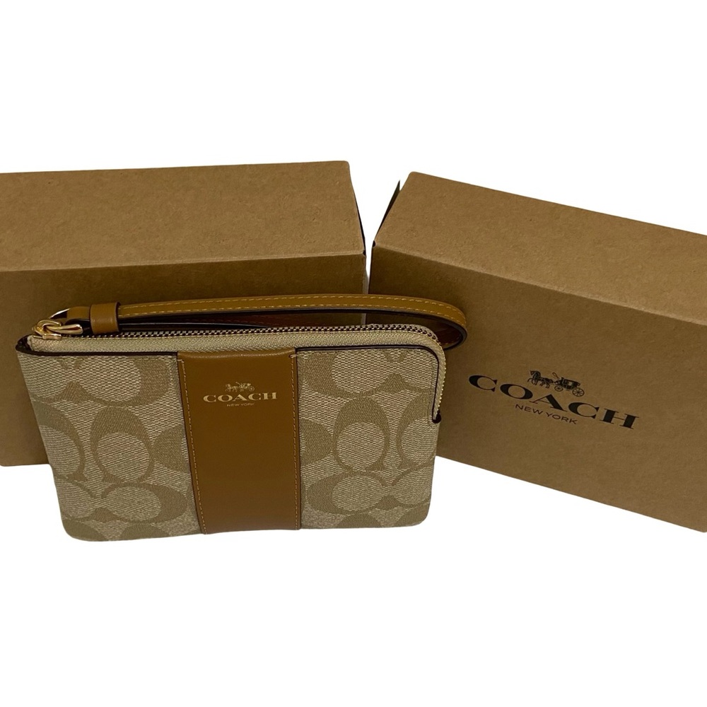 Corner Zip Wristlet In Signature Canvas